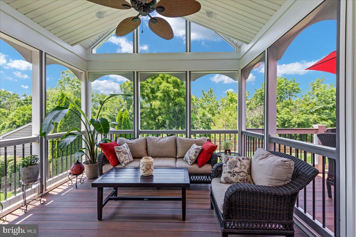 8236 Sunset Drive Manassas, VA 20110 - Photo 22 of 53 a balcony with furniture and wooden floor