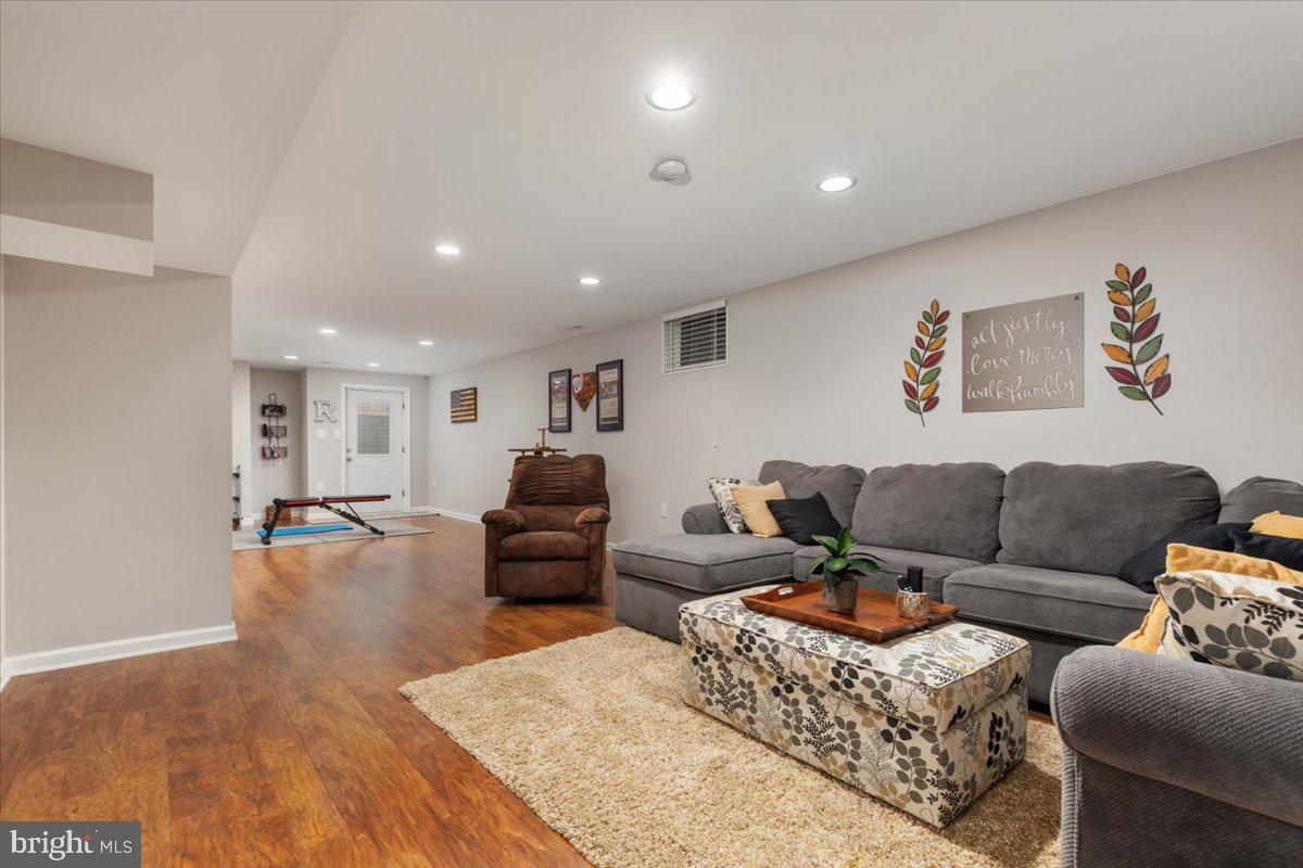 8236 Sunset Drive Manassas, VA 20110 - Photo 27 of 53 a living room with furniture window and a table