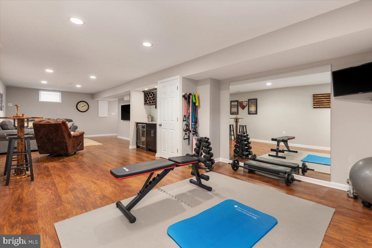 8236 Sunset Drive Manassas, VA 20110 - Photo 30 of 53 a view of a livingroom with workspace and a couch