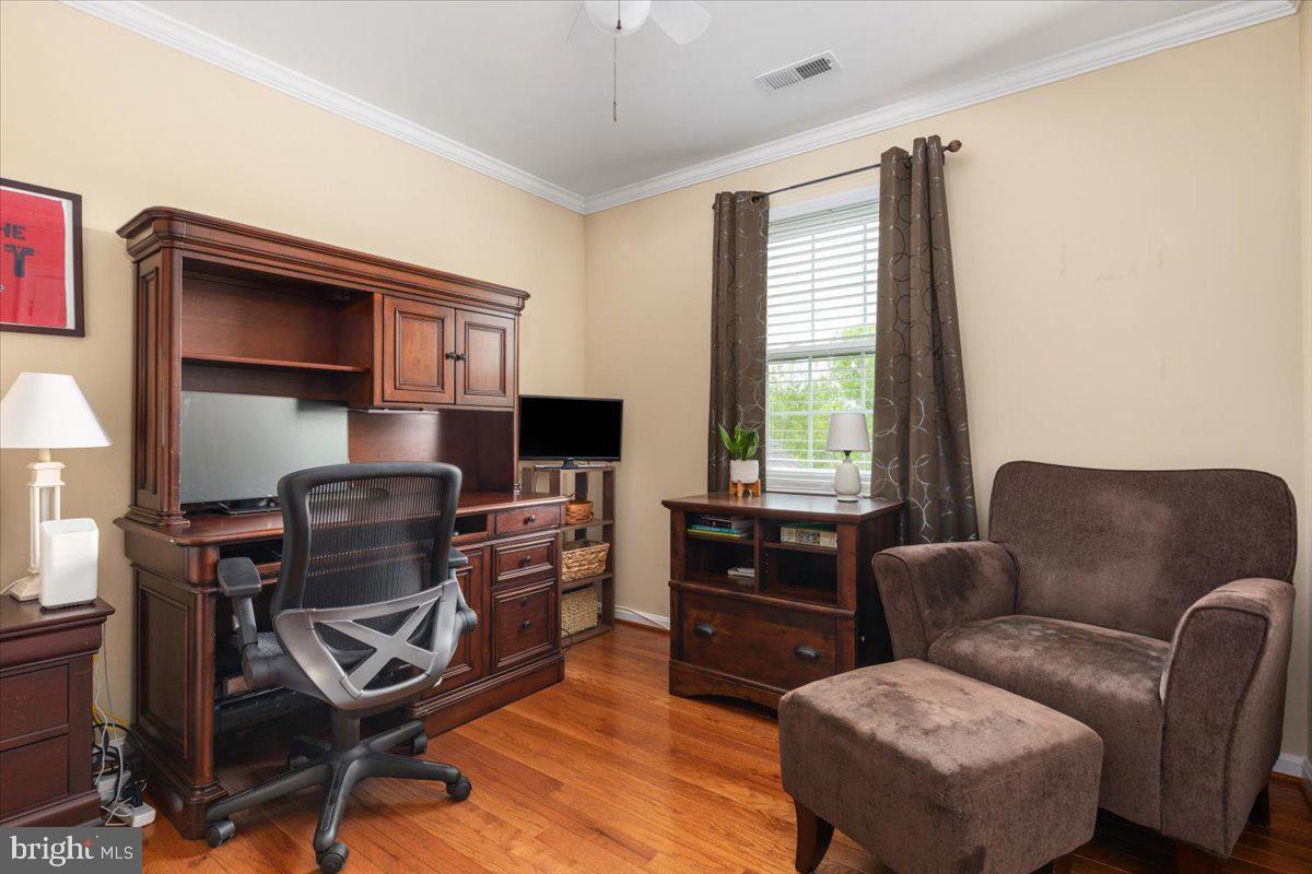 8236 Sunset Drive Manassas, VA 20110 - Photo 34 of 53 a view of a livingroom with workspace and a window