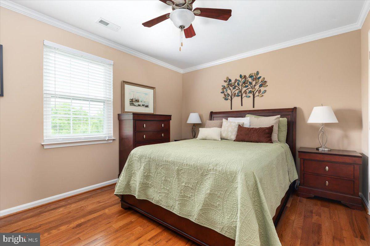 8236 Sunset Drive Manassas, VA 20110 - Photo 36 of 53 a bedroom with a bed and window