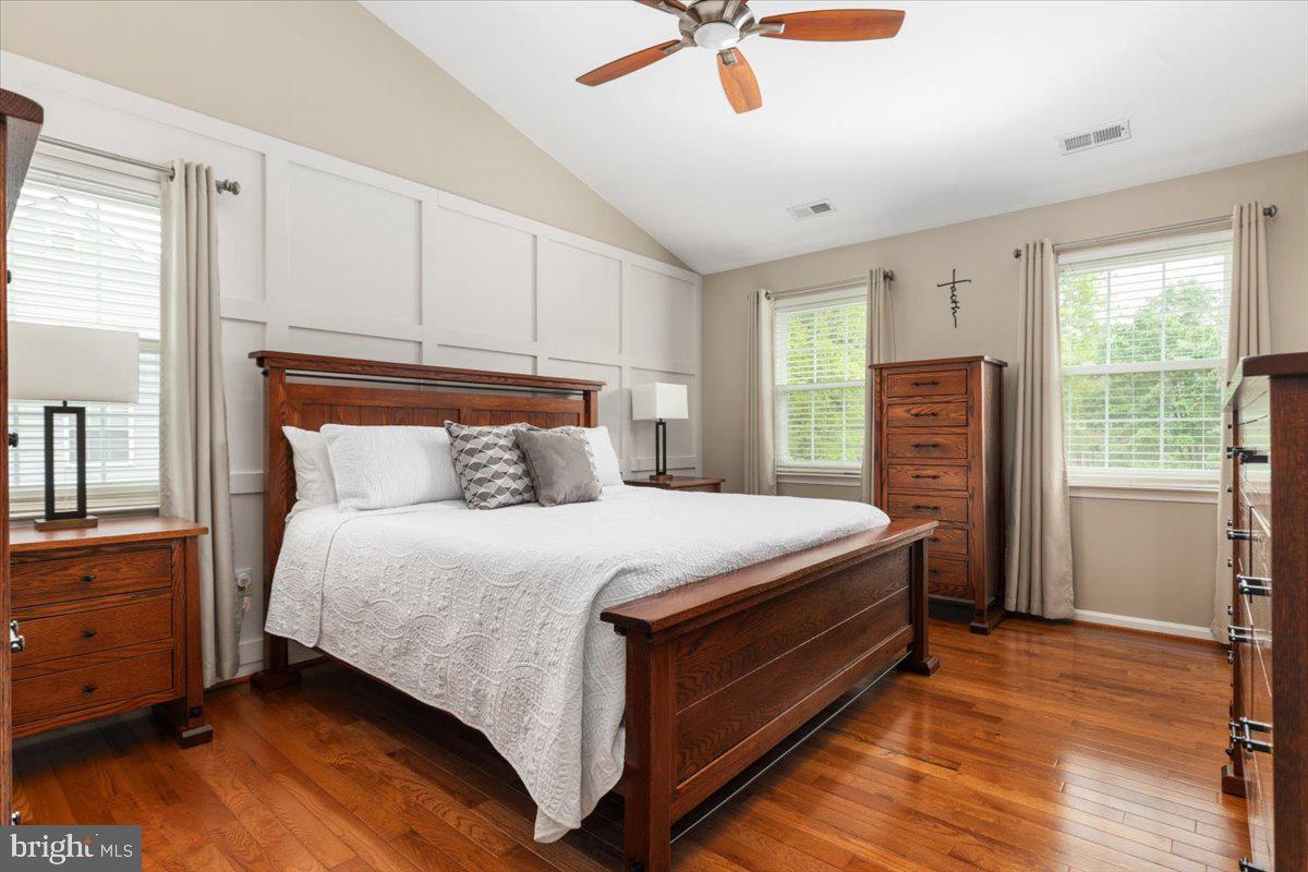 8236 Sunset Drive Manassas, VA 20110 - Photo 37 of 53 a bed sitting in a spacious bedroom next to a window
