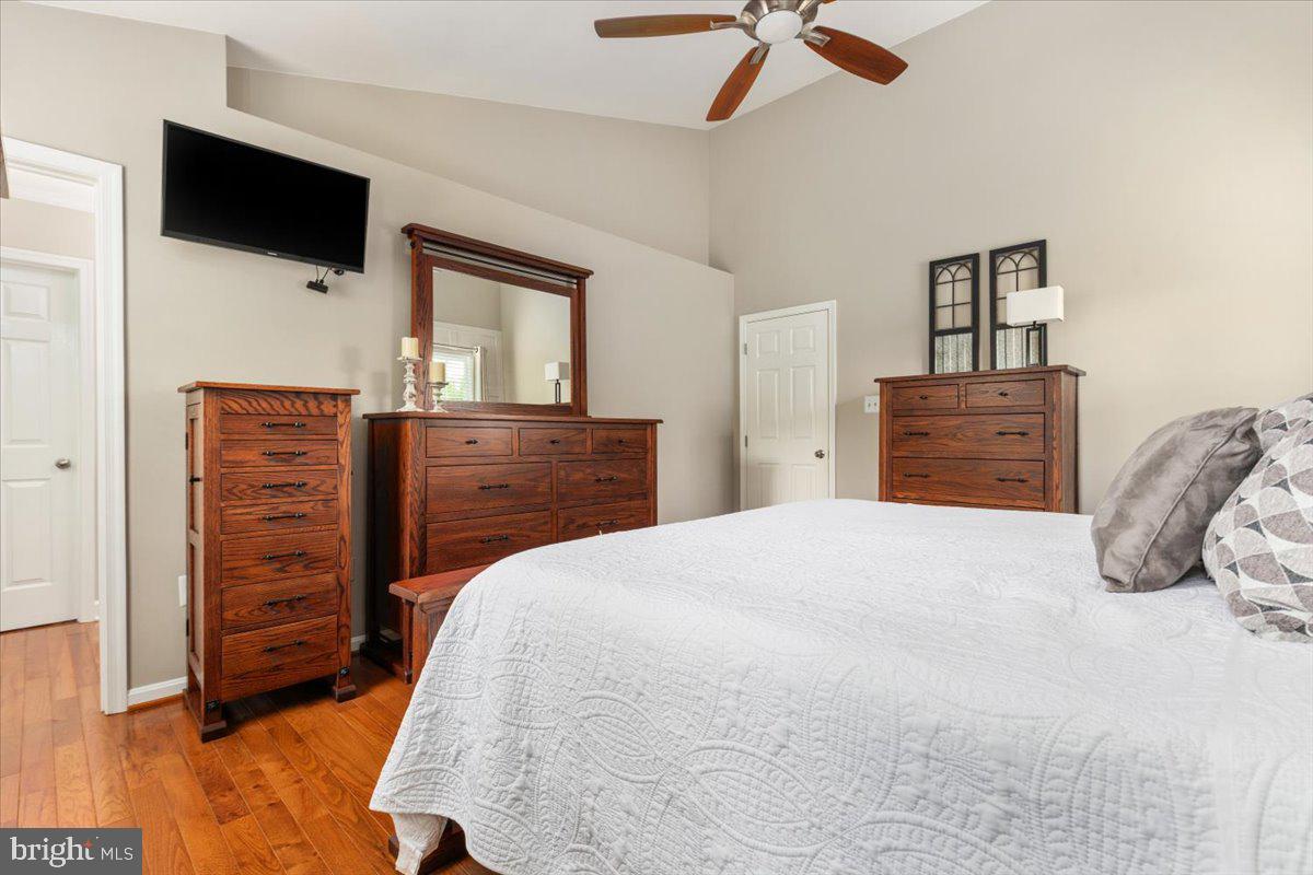 8236 Sunset Drive Manassas, VA 20110 - Photo 38 of 53 a bedroom with a bed and a television