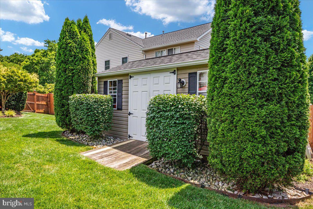 8236 Sunset Drive Manassas, VA 20110 - Photo 47 of 53 a view of a house with a yard