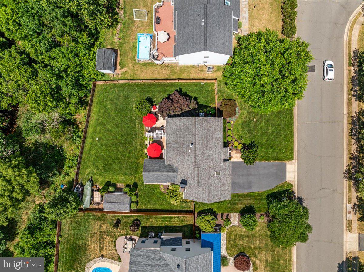 8236 Sunset Drive Manassas, VA 20110 - Photo 50 of 53 an aerial view of a house with table and chairs and potted plants
