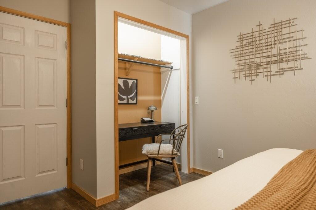 790 North Laura Street Ridgway, CO 81432 - Photo 27 of 42 a bedroom with a bed and a table