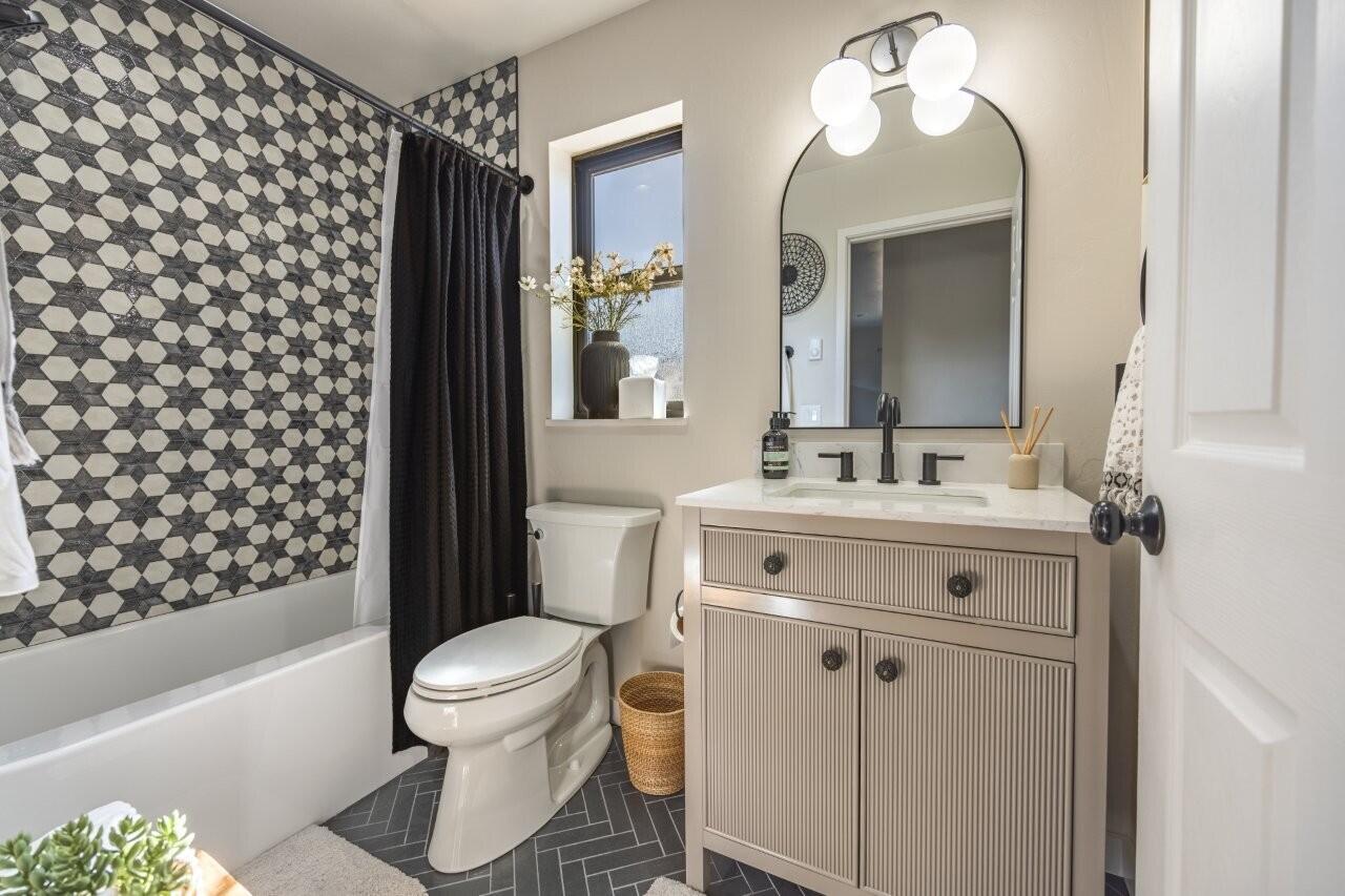 790 North Laura Street Ridgway, CO 81432 - Photo 29 of 42 a bathroom with a sink toilet and shower