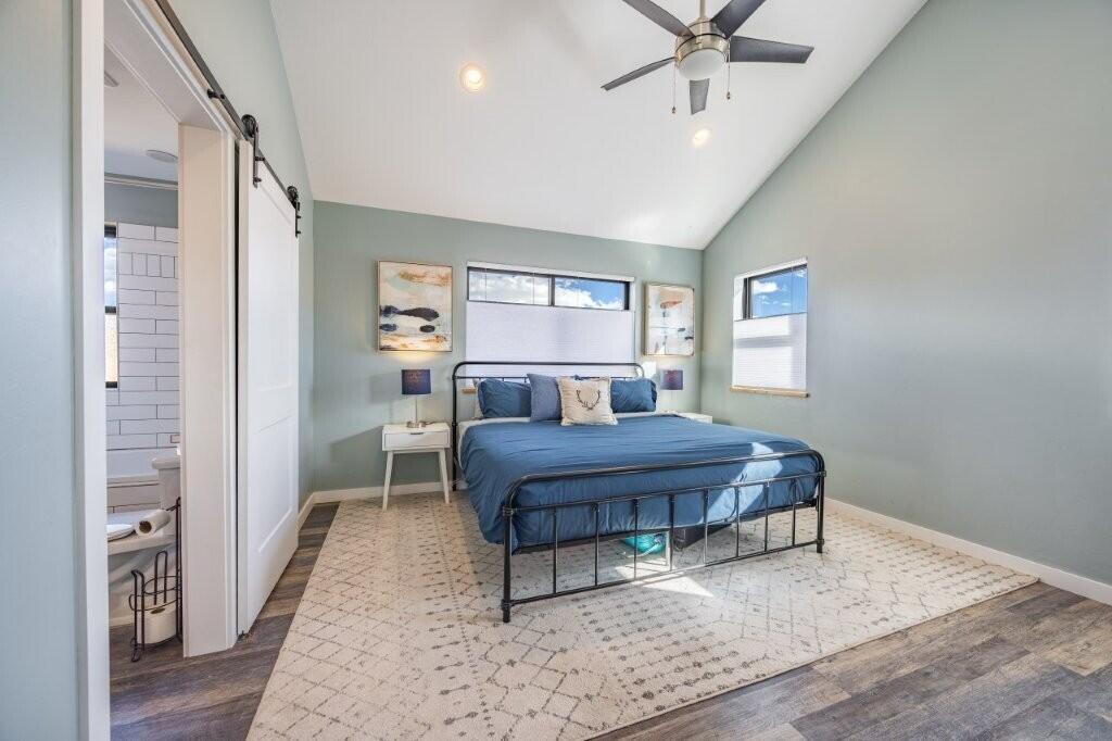 790 North Laura Street Ridgway, CO 81432 - Photo 5 of 42 a living room with a bed furniture and a window