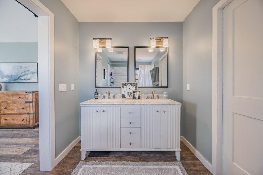 790 North Laura Street Ridgway, CO 81432 - Photo 8 of 42 a bathroom with a sink and a mirror