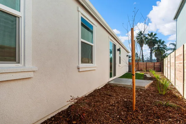 a house that has a potted plant on it