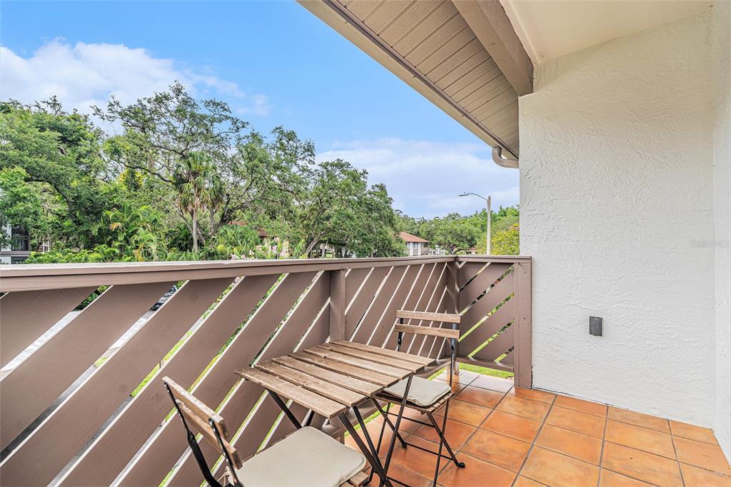 2368 Flanders Way, Unit D Safety Harbor, FL 34695 - Photo 16 of 25 a view of balcony with wooden floor