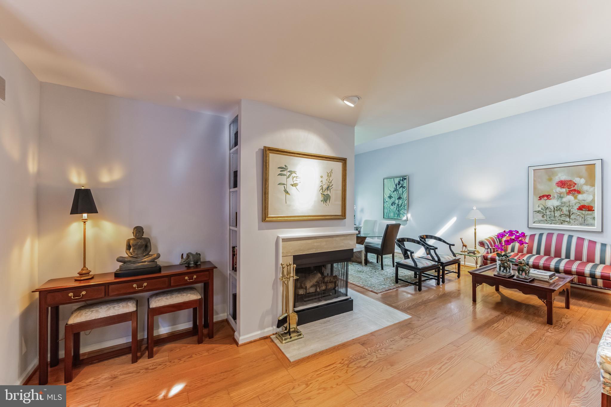 34 Mallard Mill Run Wallingford, PA 19086 - Photo 12 of 31 a living room with furniture a window and a fireplace
