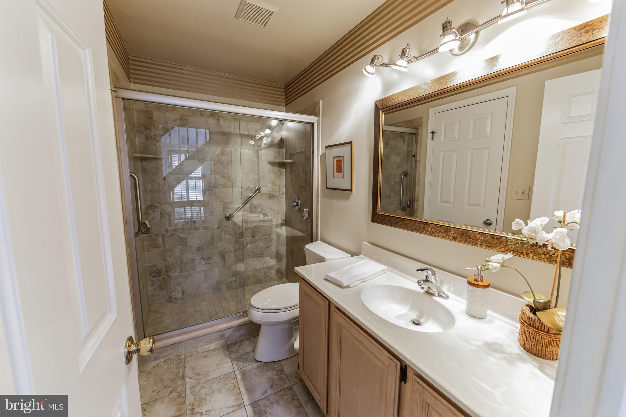 34 Mallard Mill Run Wallingford, PA 19086 - Photo 15 of 31 a bathroom with a sink toilet and shower