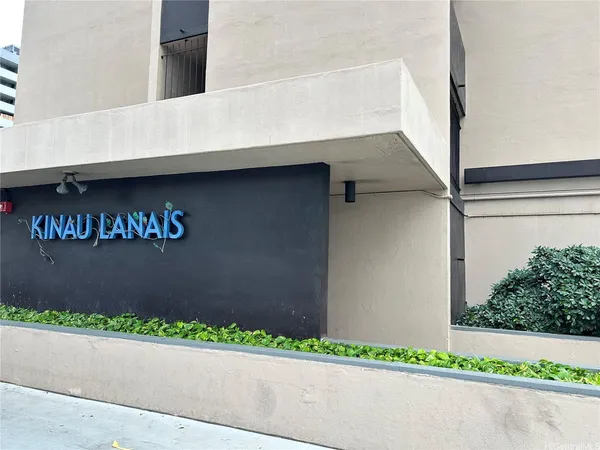 a sign that is on the side of a building