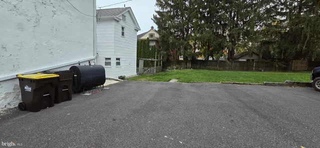 a view of a house with a street