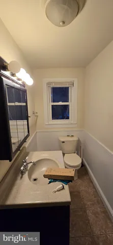 a view of a house with a street