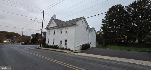 a front view of a house with outdoor space