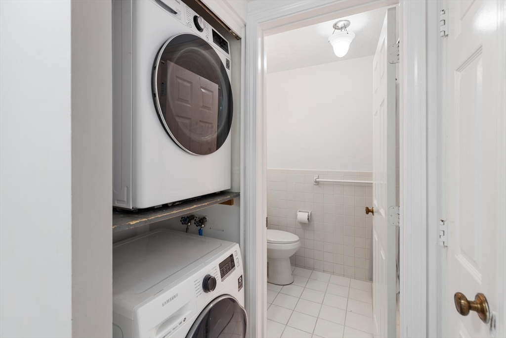 5 April, Unit 12 Lexington, MA 02421 - Photo 27 of 32 a view of bathroom with washing machine