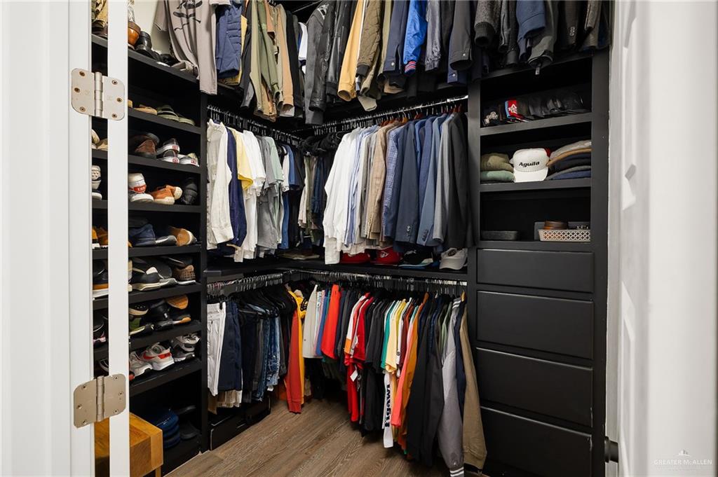 1803 Melissa Rae Drive Mission, TX 78572 - Photo 15 of 31 Spacious closet with dark wood-type flooring
