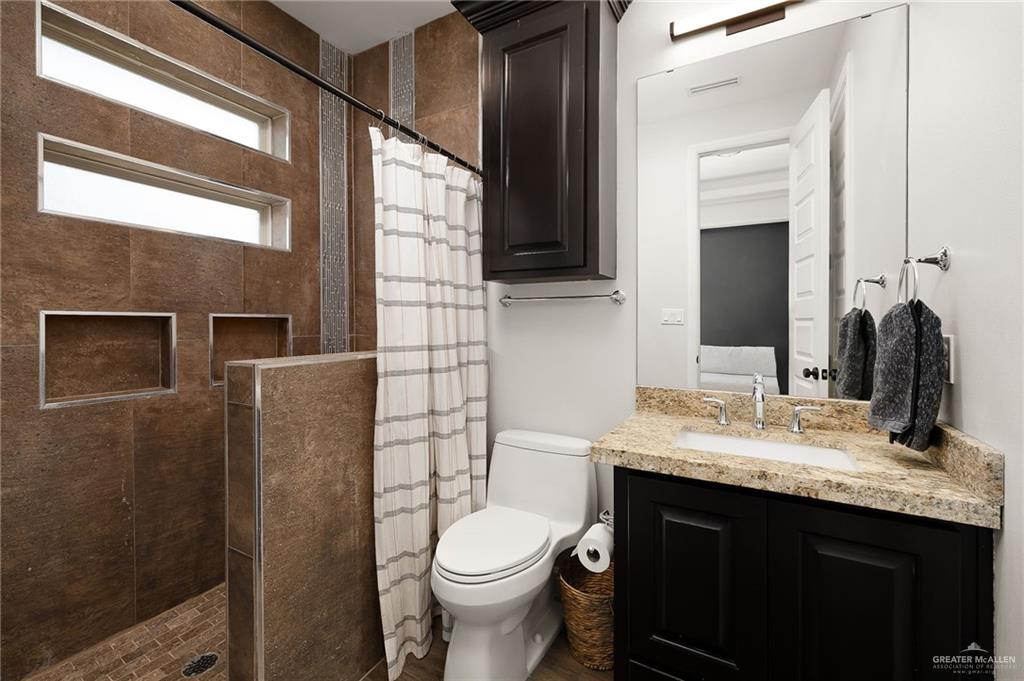 1803 Melissa Rae Drive Mission, TX 78572 - Photo 20 of 31 Full bath featuring a stall shower and vanity