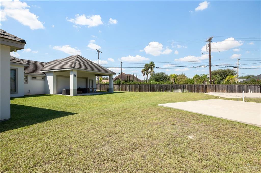 1803 Melissa Rae Drive Mission, TX 78572 - Photo 28 of 31 Fenced backyard with a patio