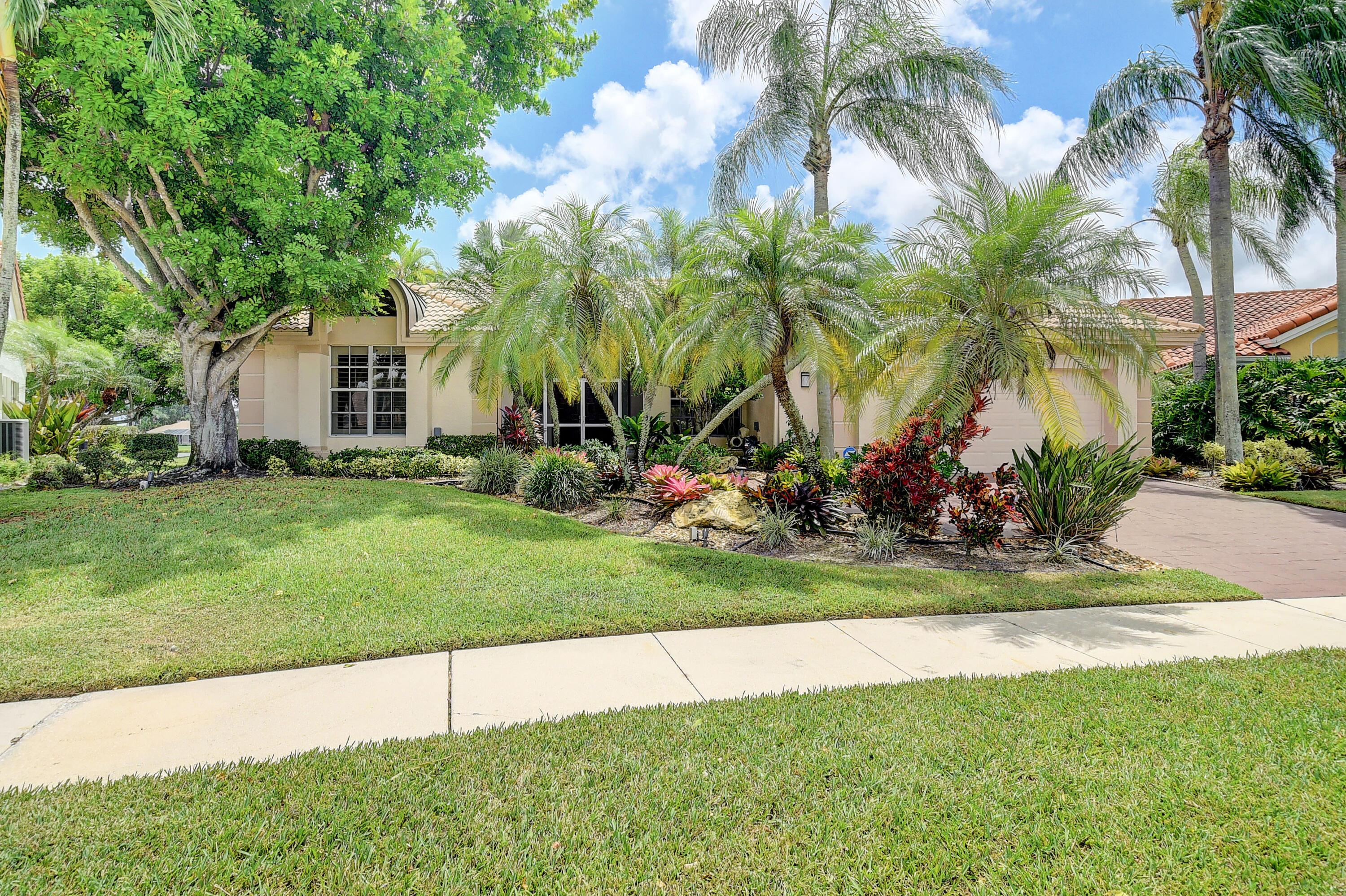 7812 Dorchester Road Boynton Beach, FL 33472 - Photo 2 of 88 FRONT