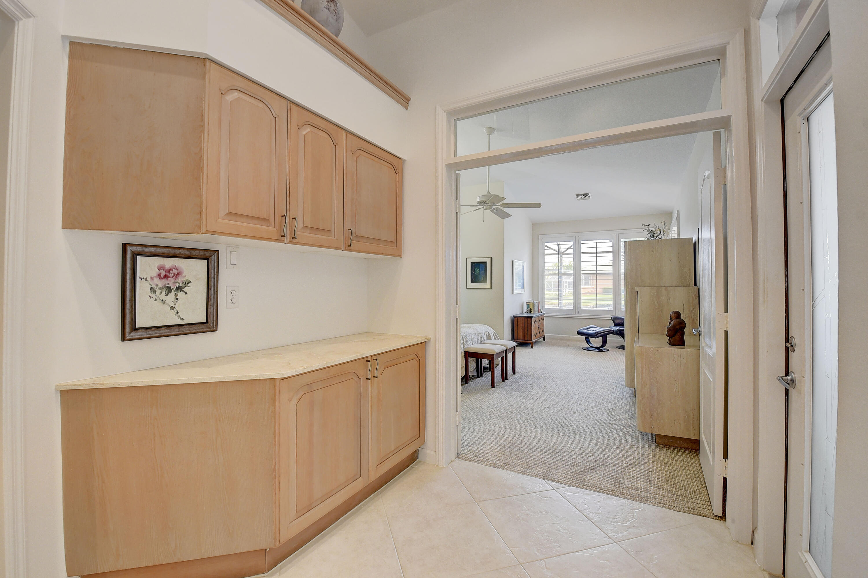 7812 Dorchester Road Boynton Beach, FL 33472 - Photo 24 of 88 INTO PRIMARY BEDROOM