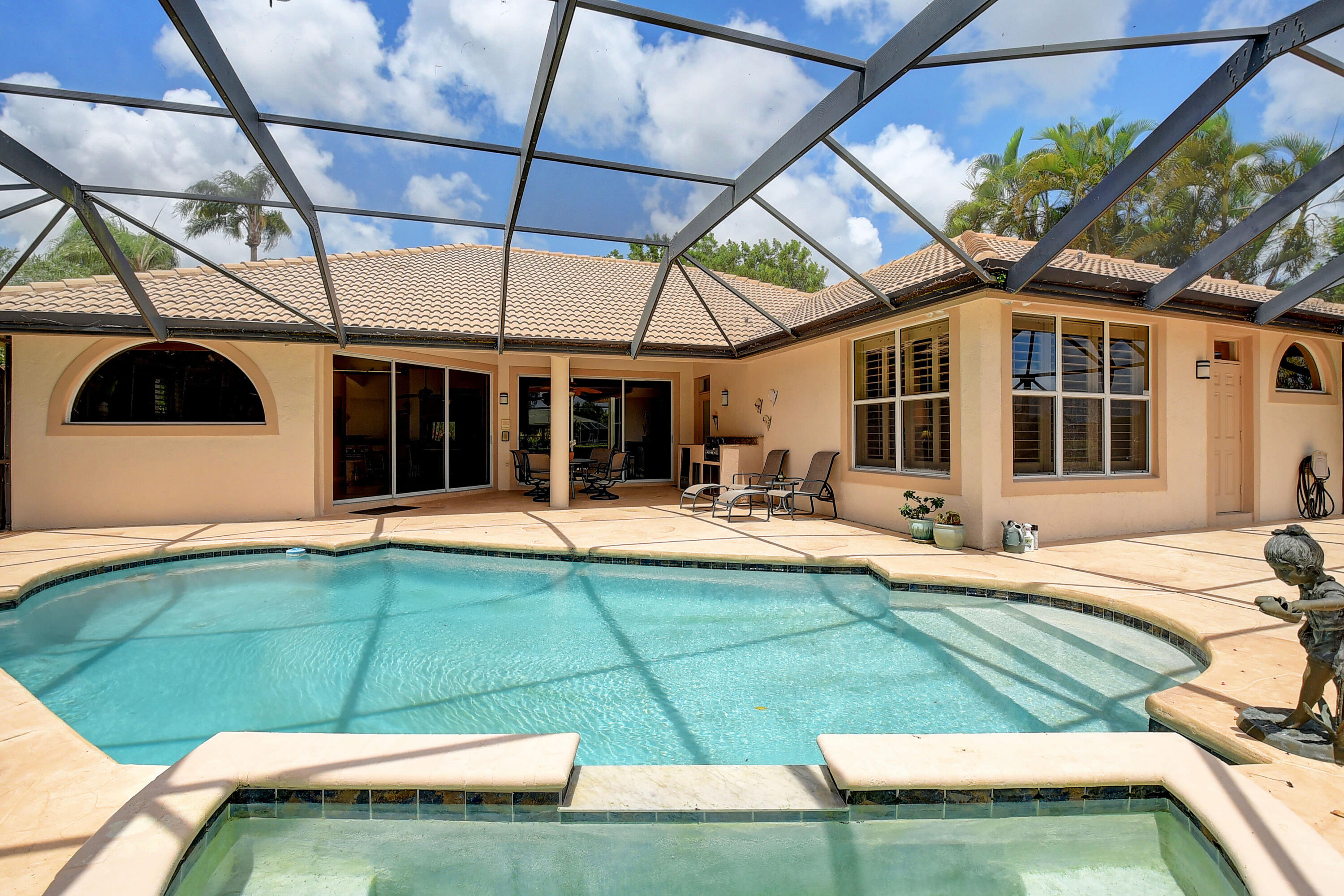 7812 Dorchester Road Boynton Beach, FL 33472 - Photo 39 of 88 COVERED AND SCREENED PATIO