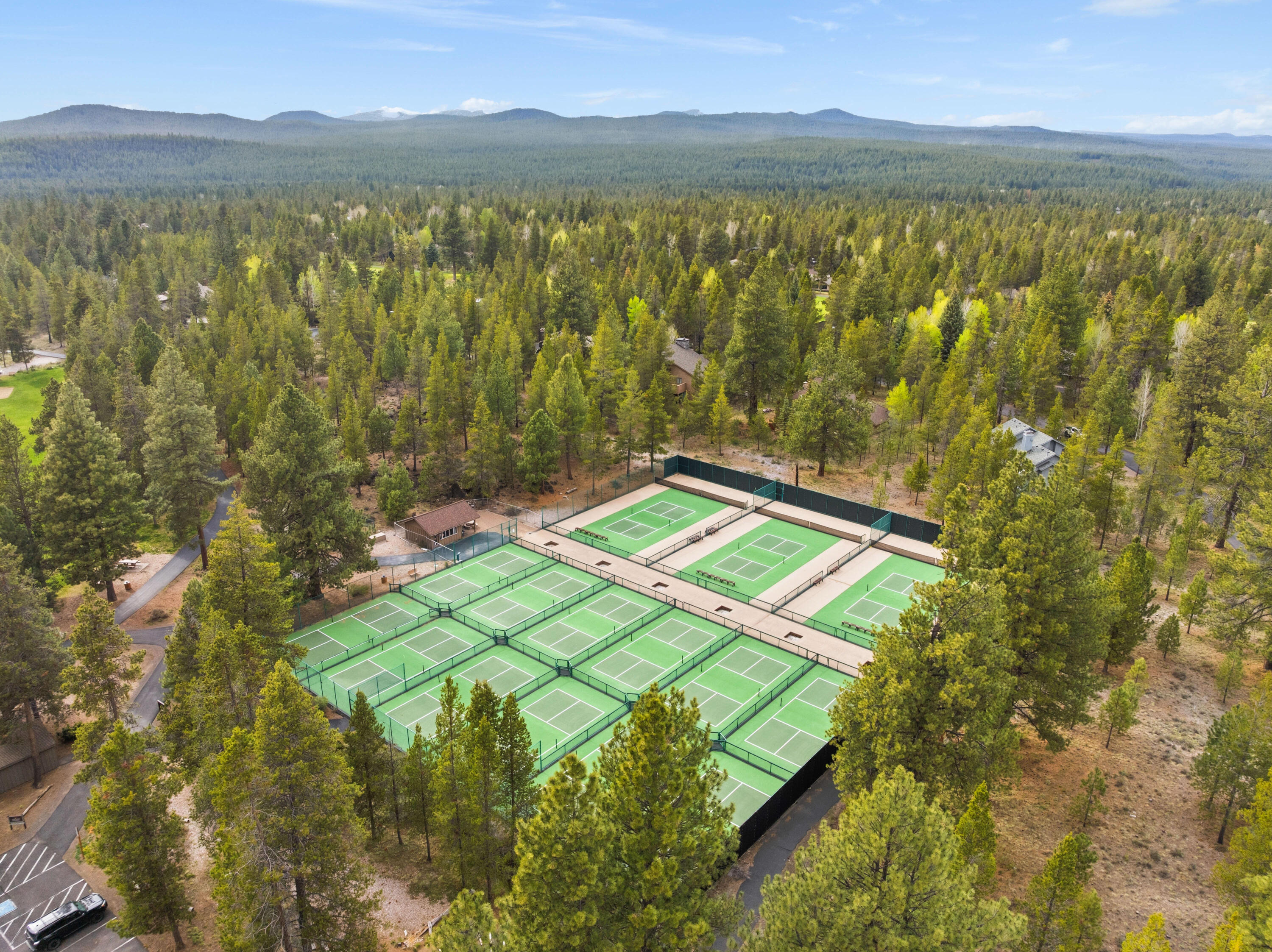 17866 Grouse Lane, Unit 3 Sunriver, OR 97707 - Photo 51 of 61 a view of a lake with a mountain