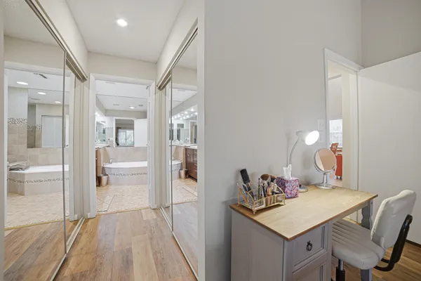 a kitchen with a table and chairs
