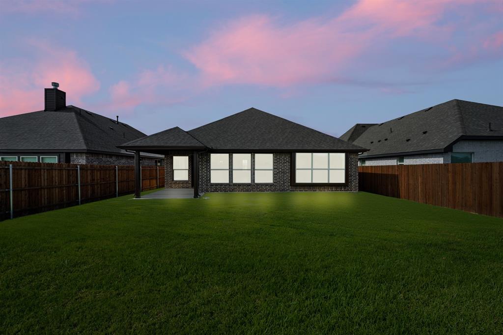 10809 Rothland Street Crowley, TX 76036 - Photo 25 of 30 a backyard of a house with lots of green space