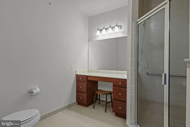 a bathroom with a toilet and a sink