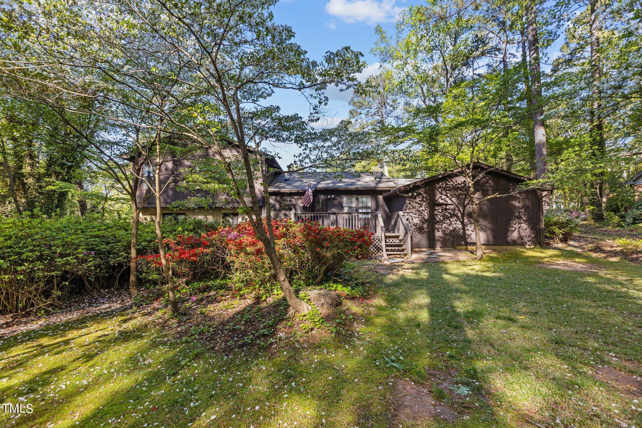 1500 Princess Anne Road Raleigh, NC 27607 - Photo 2 of 37 a view of a house with a tree bath and yard