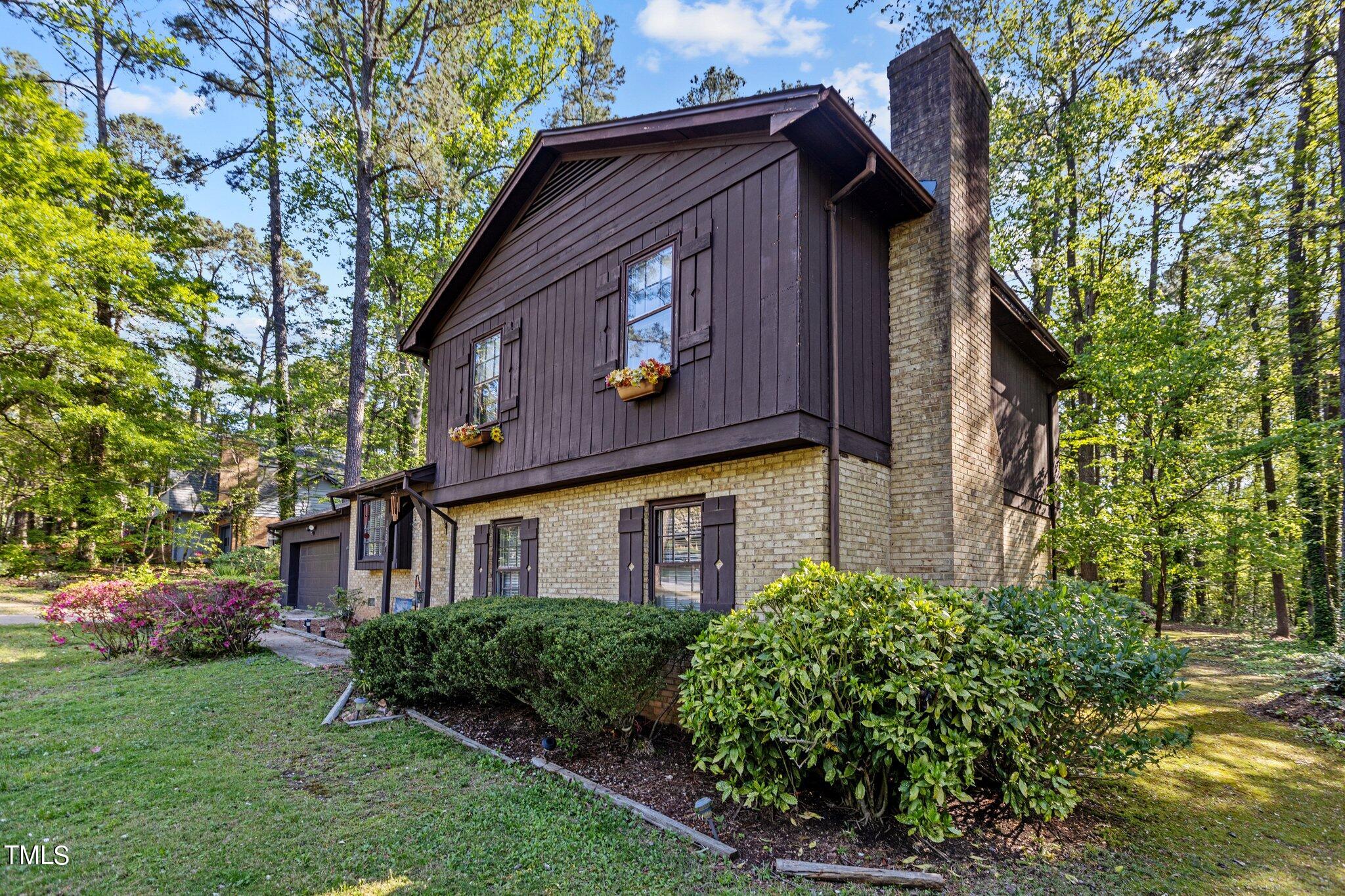 1500 Princess Anne Road Raleigh, NC 27607 - Photo 31 of 37 a brick building with a large windows