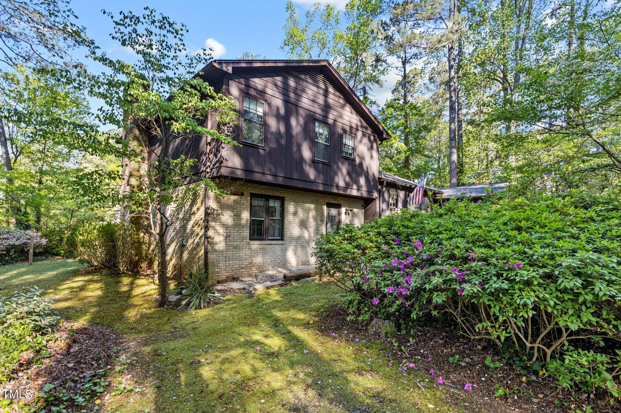 1500 Princess Anne Road Raleigh, NC 27607 - Photo 32 of 37 a front view of a house with a yard