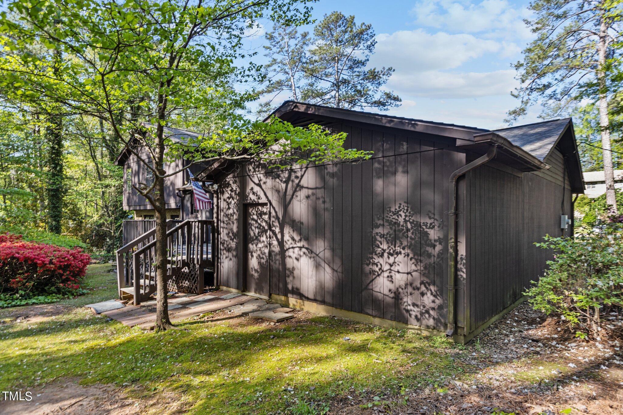 1500 Princess Anne Road Raleigh, NC 27607 - Photo 33 of 37 a backyard of a house with lots of green space