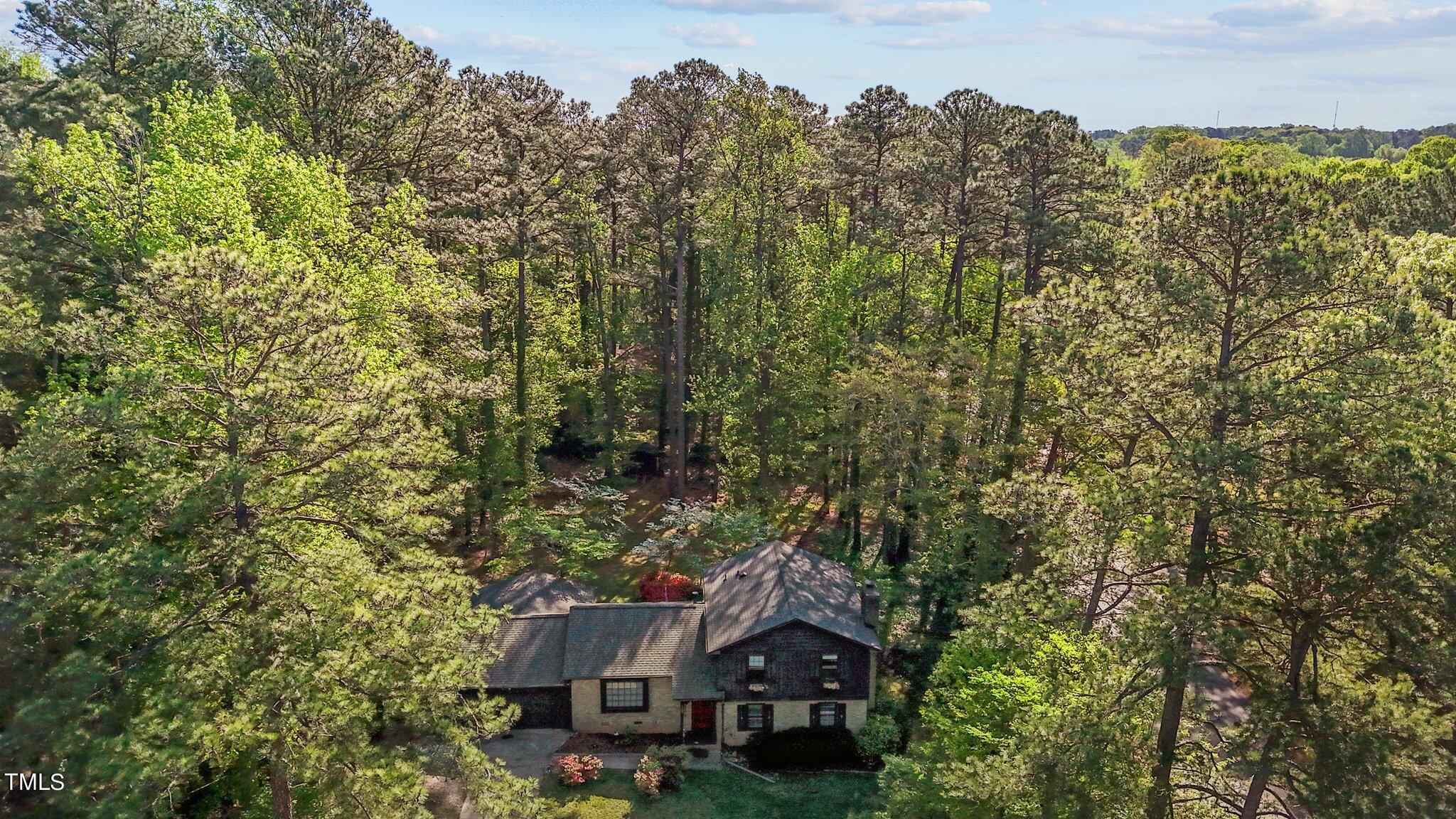 1500 Princess Anne Road Raleigh, NC 27607 - Photo 35 of 37 an aerial view of a house with yard and outdoor seating