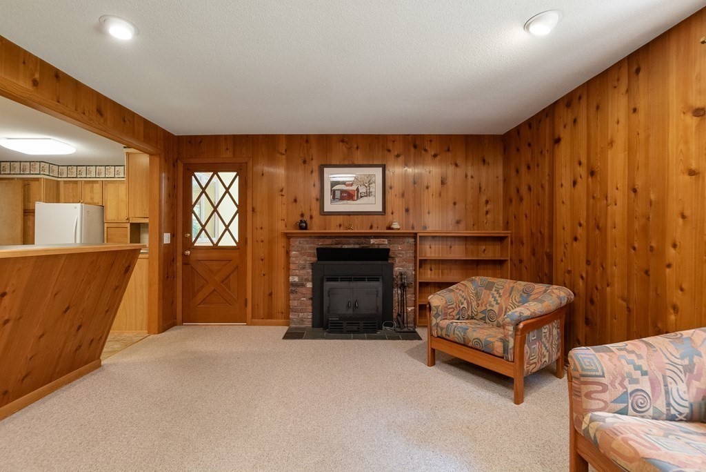 83 Redfern Drive Longmeadow, MA 01106 - Photo 12 of 40 a living room with furniture and a flat screen tv