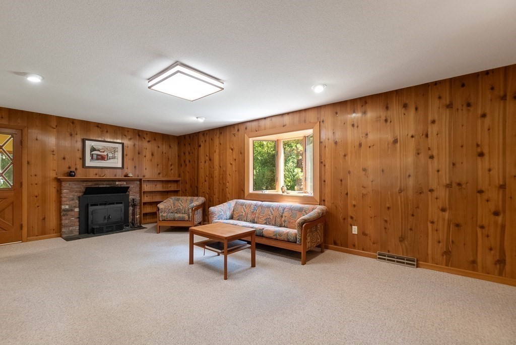 83 Redfern Drive Longmeadow, MA 01106 - Photo 14 of 40 a living room with furniture and a flat screen tv