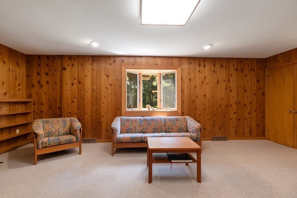 83 Redfern Drive Longmeadow, MA 01106 - Photo 15 of 40 a living room with furniture and a window