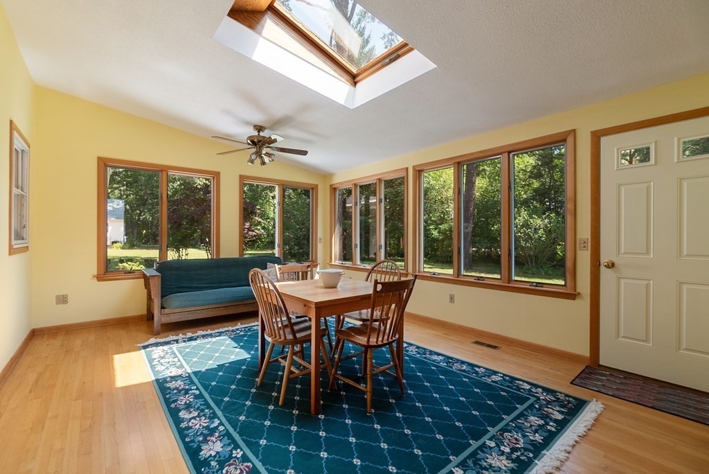83 Redfern Drive Longmeadow, MA 01106 - Photo 16 of 40 a view of a dining room with furniture window and wooden floor