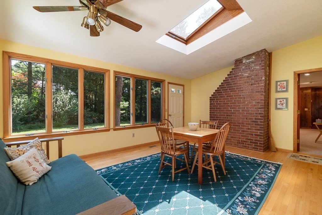 83 Redfern Drive Longmeadow, MA 01106 - Photo 17 of 40 a dining room with furniture window and wooden floor
