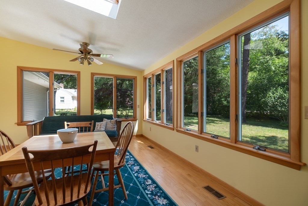 83 Redfern Drive Longmeadow, MA 01106 - Photo 19 of 40 a dining room with furniture a chandelier and wooden floor
