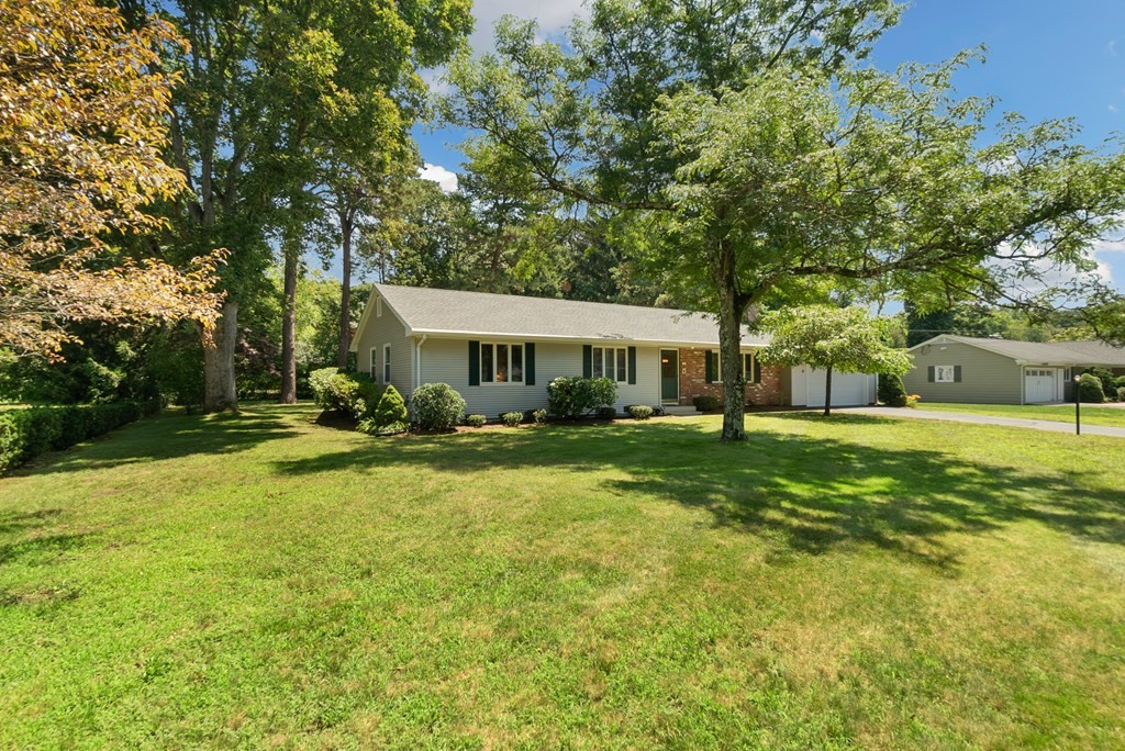 83 Redfern Drive Longmeadow, MA 01106 - Photo 2 of 40 a front view of a house with swimming pool