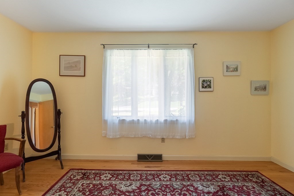83 Redfern Drive Longmeadow, MA 01106 - Photo 21 of 40 a room with a door and a window