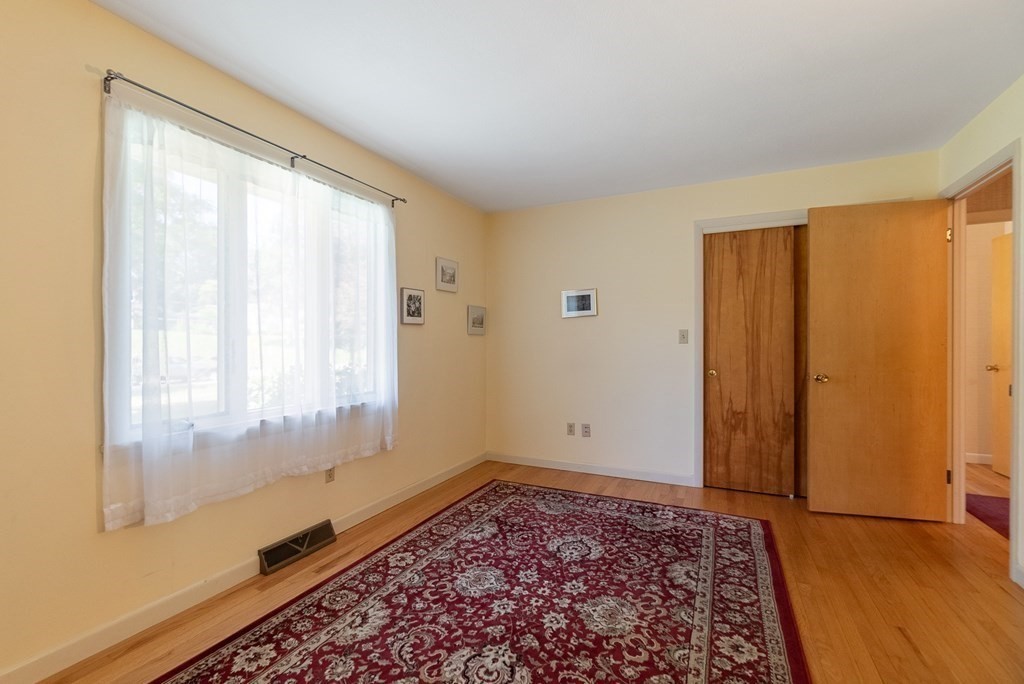 83 Redfern Drive Longmeadow, MA 01106 - Photo 22 of 40 a view of an empty room with a window