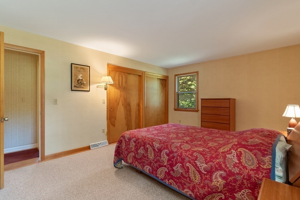 83 Redfern Drive Longmeadow, MA 01106 - Photo 31 of 40 a bed sitting in a spacious bedroom next to a window