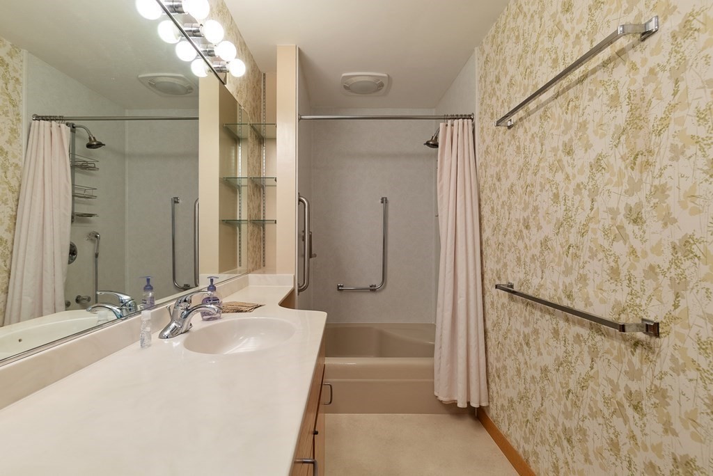 83 Redfern Drive Longmeadow, MA 01106 - Photo 33 of 40 a bathroom with a sink and shower