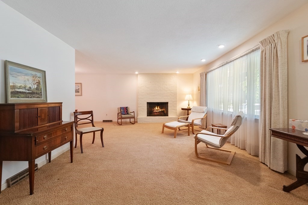 83 Redfern Drive Longmeadow, MA 01106 - Photo 5 of 40 a living room with furniture and a flat screen tv