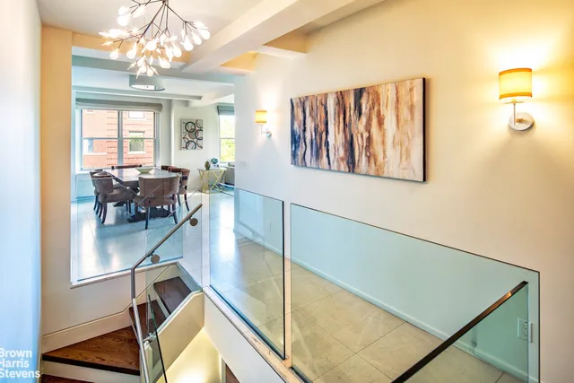 a view of a living room and dining room